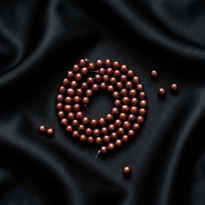 Flat lay - Dragon’s Blood Imperial Pearls